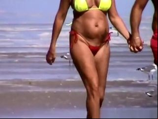 mature woman in bikini with big tits